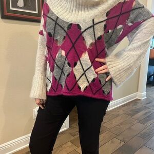 Alexander McQueen oversized off the shoulder sweater. Size Small.